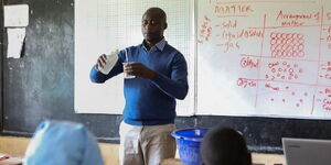 A file image of teacher Peter Tabichi at a past class session.