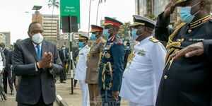 President Uhuru Kenyatta inspecting a parade at parliament for the State of the Nation address on Thursday, November 12.