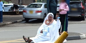 Woman protesting outside Jogoo House in Nairobi on Tuesday December 13, 2022