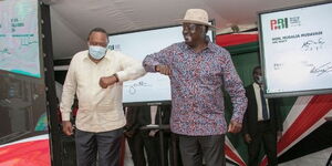 President Uhuru Kenyatta and ODM leader Raila Odinga during the launch of the referendum Bill and national signature collection drive on Wednesday, November 25.
