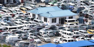 Imported used vehicles parked at a yard in Mombasa