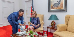 First Lady Rachel Ruto hosts Italy's First Lady Laura Mattarella and serves her a drink at State House, Nairobi on March 14, 2023.