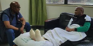 Undated image of Jimi Wanjigi together with Moses Kuria in hospital