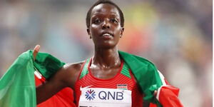 Agnes Tirop celebrates winning bronze in the Women's 10,000m final at the World Athletics Championships in Doha in 2019