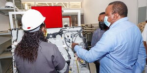 President Uhuru Kenyatta commissions local assembly of Proton Saga saloon cars on Thursday, December 10