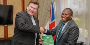 UK Minister of Armed Forces James Heappey and Leader of the Majority Kimani Ichung'wah during a meeting on Wednesday, November 23