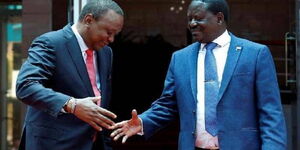 President Uhuru Kenyatta and former Prime Minister Raila Odinga shake hands on March 9, 2018.