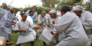 A photo of the Langata Women Prisoners Showing their dancing skills