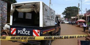 An undated image of a police vehicle at a scene of a crime.