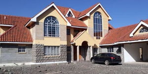 A photo of a house and car parked in property in Karen, Nairobi taken on Feb 14, 2018