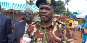 Trans Nzoia county commissioners Samson Ojwang addresses journalists on the sidelines of the international literacy day in Kitale