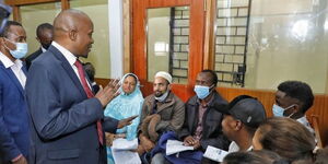 Interior CS Kithure Kindiki interacts with members of the public during an impromptu meeting at Nyayo House on November 29, 2022. 