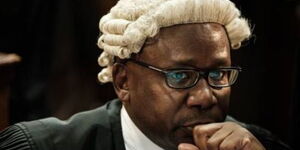 Former Attorney General Githu Muigai looks on before the hearing seeking to nullify the October 26, 2017 repeat presidential election on grounds that the IEBC did not conduct fresh nominations for candidates before gazetting the names and proceeding with the poll, on November 14, 2017, at the Supreme Court.