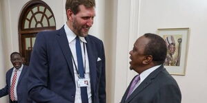 President Uhuru Kenyatta and former NBA player Dirk Nowitzki during a State banquet on Monday, February 24.