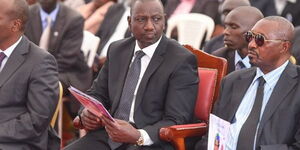 Nakuru Governor Lee Kinyanjui and Deputy President William Ruto during a funeral service on Wednesday, February 26.