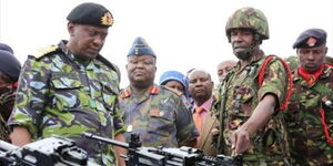 President Uhuru Kenyatta inspecting military equipment