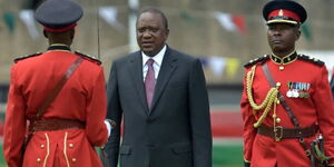 President Uhuru Kenyatta reviews a guard of honour during his inauguration ceremony for a second term at Kasarani Stadium on November 28, 2017