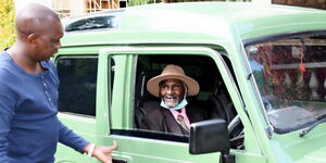 Kapeseret MP Oscar Sudi with Kimisoi Kurgat Arap Ng'isirei during his 100th birthday on July 14, 2020