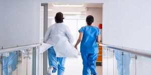 A file photo od doctors running in a hospital corridor 