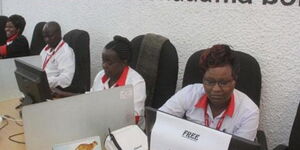 Huduma Center staff at their work desks