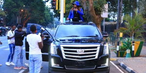 Local musician Reds Hot shooting a music video in Governor Mike Sonko's Cadillac Escalade on August 29, 2020