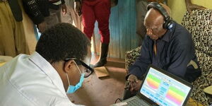 136-year-old John Wanyondu receiving treatment for his hearing loss on September 11, 2020
