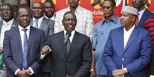 Deputy President William Ruto with Jubilee Secretary General Raphael Tuju and Garissa MP Aden Duale at Jubilee headquarters during a past event