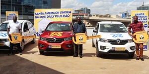 An image of three lucky winners of Mozzart Bet's Omoka na Moti promotion.