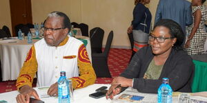 Former IEBC Commissioner Justus Nyang'aya (left) and Commissioner Irene Masit during a consultative meeting with partners and stakeholders  on October 12, 2022. 