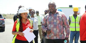 Energy Principal Secretary Alex Wachira (right) takes a tour of the Suswa Substation in Narok on January 13, 2022. 