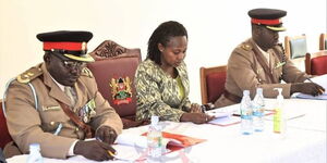Chief Magistrate Agnes Wahito (center) and two military officers preside over a court martial hearing held on January 19, 2023 at the Lang'ata Barracks.