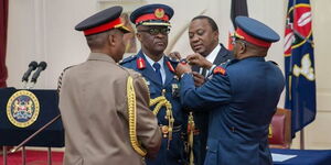 An image of Lt. General Francis Ogolla being promoted to Air Force commander by former President Uhuru Kenyatta