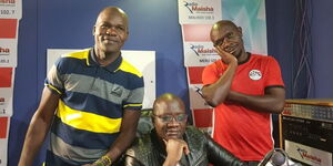 Radio Maisha veteran presenter Ali Hassan Kauleni (centre) poses for a photo with his former coleagues at Radion Maisha on February 18, 2023.