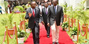President William Ruto (right) and Trans Nzoia Governor George Natembeya take a stroll at State House Gardens on March 15, 2023. 