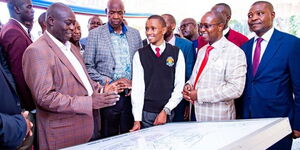 Deputy President Rigathi Gachagua interacts with students and alumbi of Kianyaga Hgh School during his visit on March 18, 2023. 