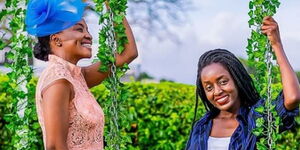 A photo of Valentine Nekesa (left) with a friend wearing her designs at the Ngong Race Course on March 10, 2020.