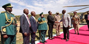President Ruto greets CS Aisha Jumwa