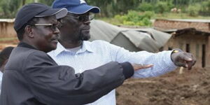 West Pokot Governor John Lonyangapuo and his Turkana counterpart Josphat Nanok assess damages after landslides affected West Pokot County in November 2019 
