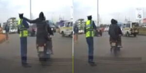 A screenshot of a pillion passenger stealing a mobile phone from a traffic police officer