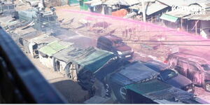 A water cannon spraying pink-dyed water at Azimio protestors in Pipeline, Nairobi on March 30, 2023.