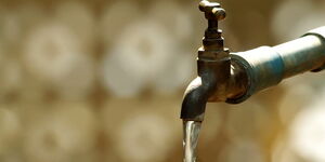 File Photo of Water Running From a Tap