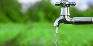 File Photo of Water Running From a Tap