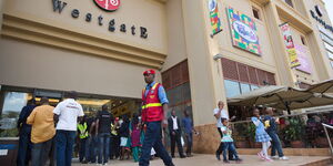People going about their day to day activities outside the Westgate Mall.