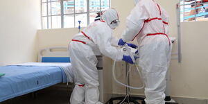 Medical practitioners dressed in protective gear at a Coronavirus isolation and treatment facility at Mbagathi District Hospital on Friday, March 6, 2020.