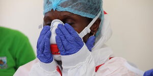 A medical practitioner dressed in protective gear at Coronavirus isolation and treatment facility in Mbagathi District Hospital on Friday, March 6, 2020.