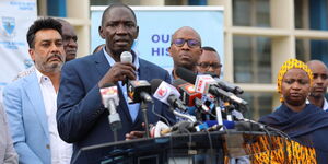 A photo of Government Spokesperson Cyrus Oguna issuing an update coronavirus at Mbagathi Hospital on Saturday, March 14, 2020