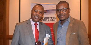 Former NTV reporter Steve Juma (right) with DCI boss George Kinoti.