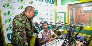 President Uhuru Kenyatta at Ruben FM with presenter Shaffie Zele on July 6