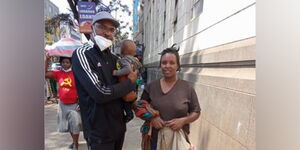 US-based coach Vincent Kwarula (left) with Ann Wanjiru in Nairobi.