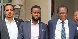 Eldas MCA elect Abdi Abass Abdullahi (centre) together with Eldas MP Adan Wehliye Keynan (right) and Jubilee party Secretary General Rafael Tuju